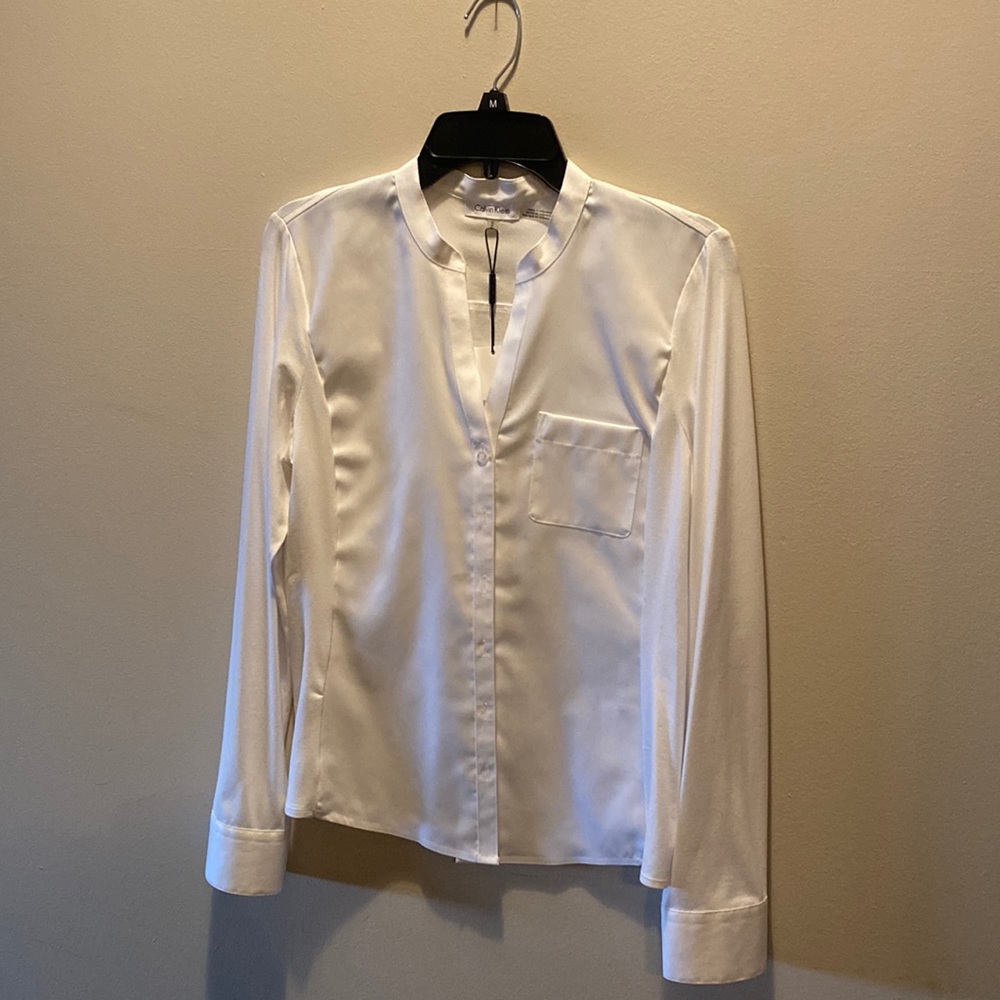 Classy and comfortable professional blouse by Calvin Klein, size medium.